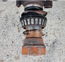 Parallel trailer spindle before replacement with a failed bearing and worn journal