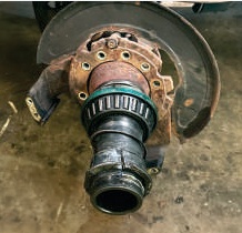 Straight truck spindle before replacement with a damaged bearing and seal surface