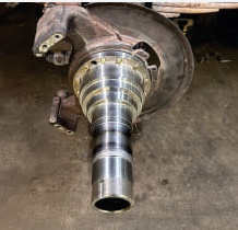 Straight truck spindle after replacement showing new machined journals