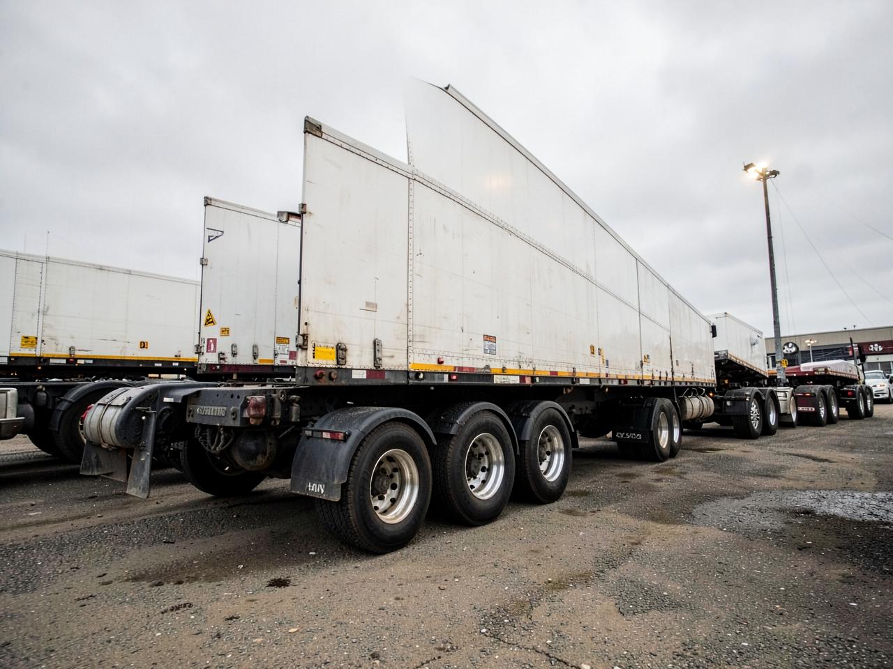 Commercial trailers staged in an Alberta fleet yard